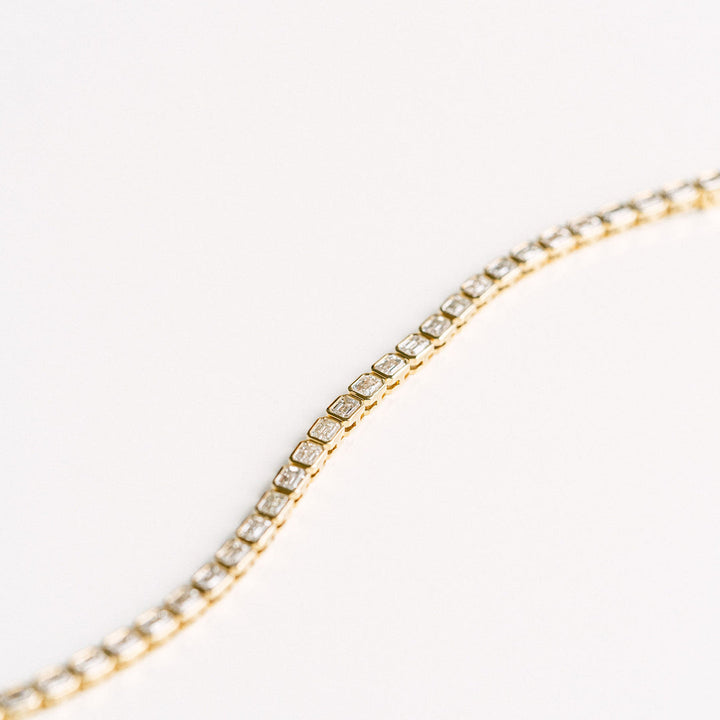 Emerald Cut East-West Diamond Bezel Tennis Bracelet