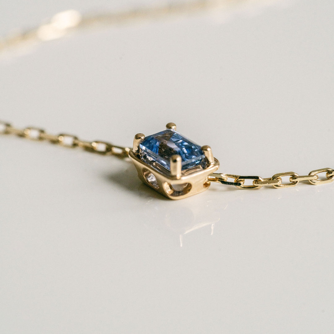Emerald Cut East-West Framed Blue Sapphire Slider Necklace