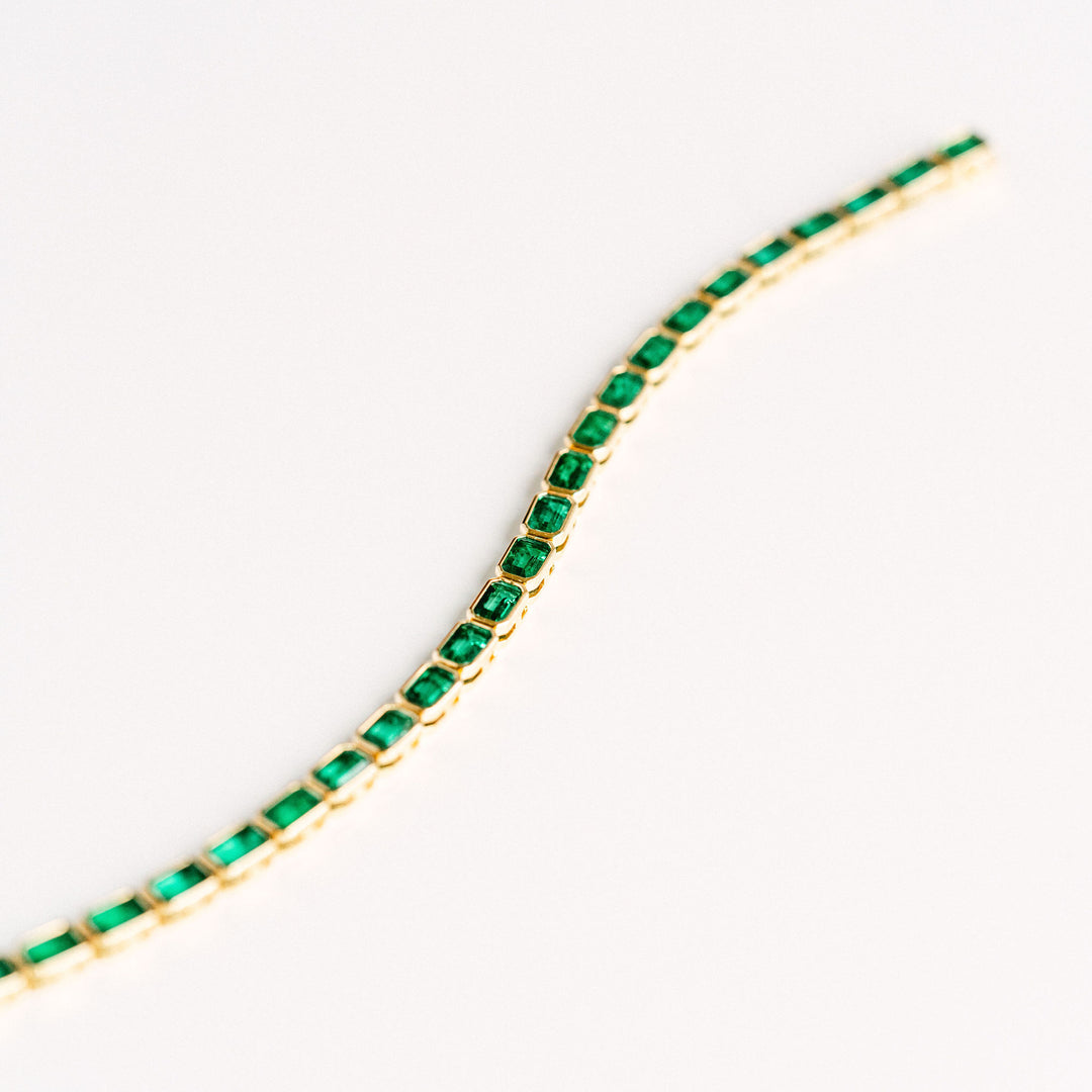 Emerald Cut Emerald East-West Bezel Tennis Bracelet