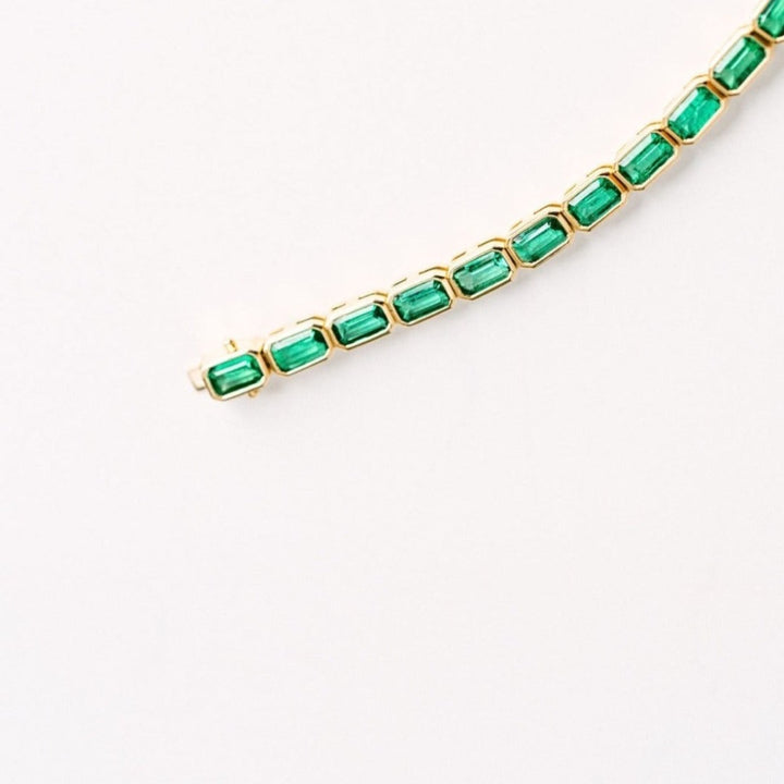 Emerald Cut Emerald East-West Bezel Tennis Bracelet