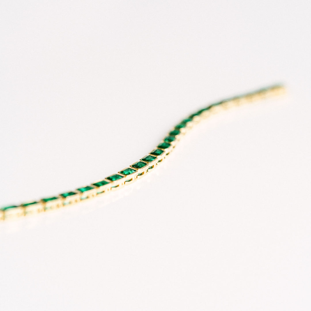 Emerald Cut Emerald East-West Bezel Tennis Bracelet