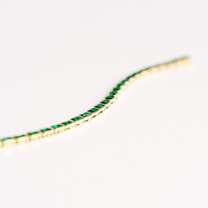 Emerald Cut Emerald East-West Bezel Tennis Bracelet