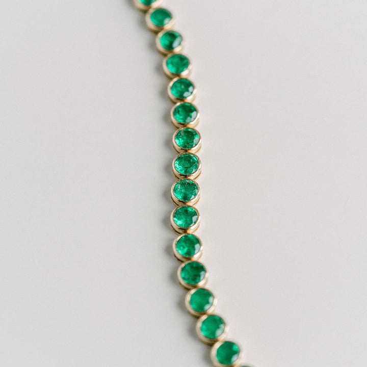 Round Emerald Bezel Tennis Bracelet With Diamonds