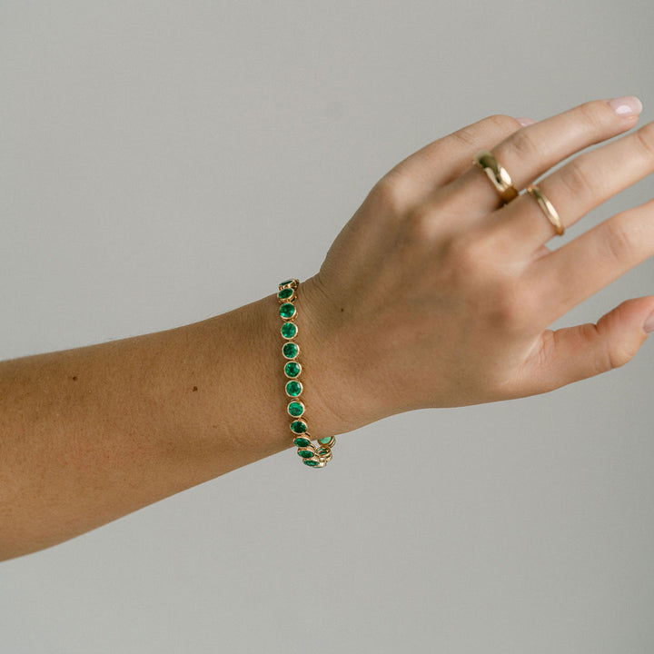 Round Emerald Bezel Tennis Bracelet With Diamonds