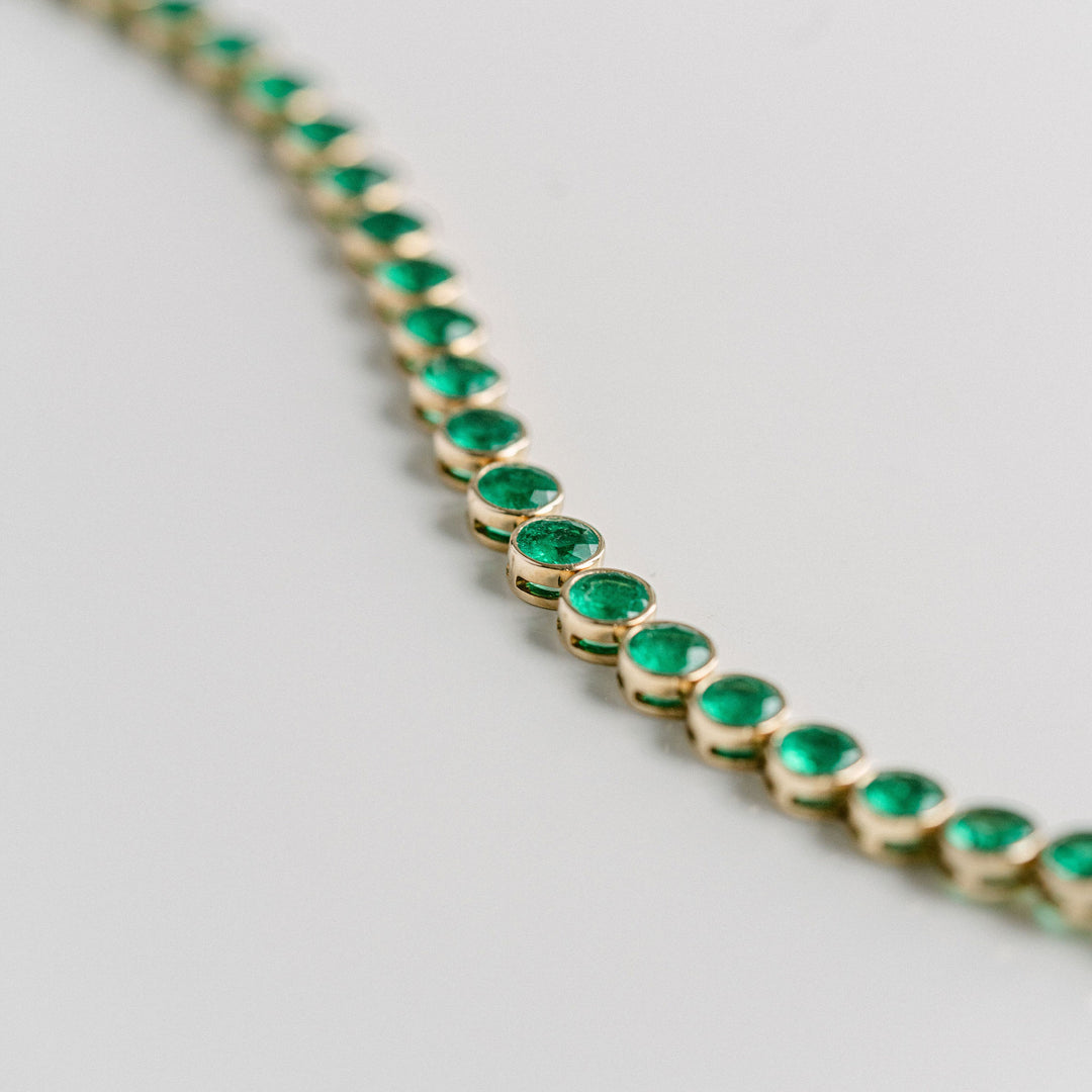 Round Emerald Bezel Tennis Bracelet With Diamonds