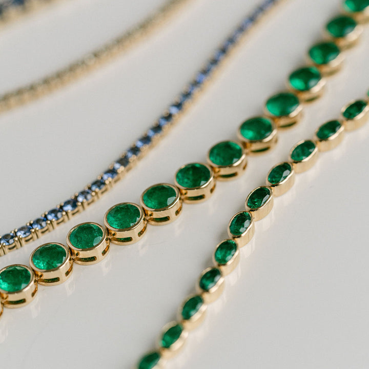 Round Emerald Bezel Tennis Bracelet With Diamonds