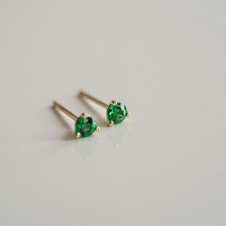 Round Emerald Studs