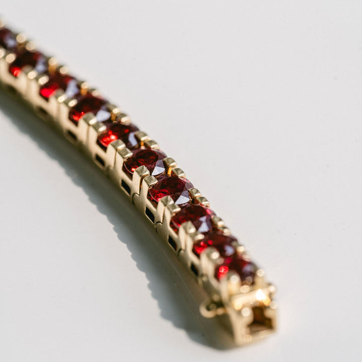 Round Ruby Tennis Bracelet With Flat Prongs