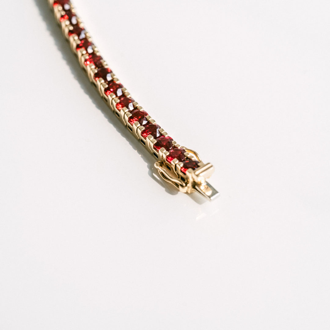 Round Ruby Tennis Bracelet With Flat Prongs