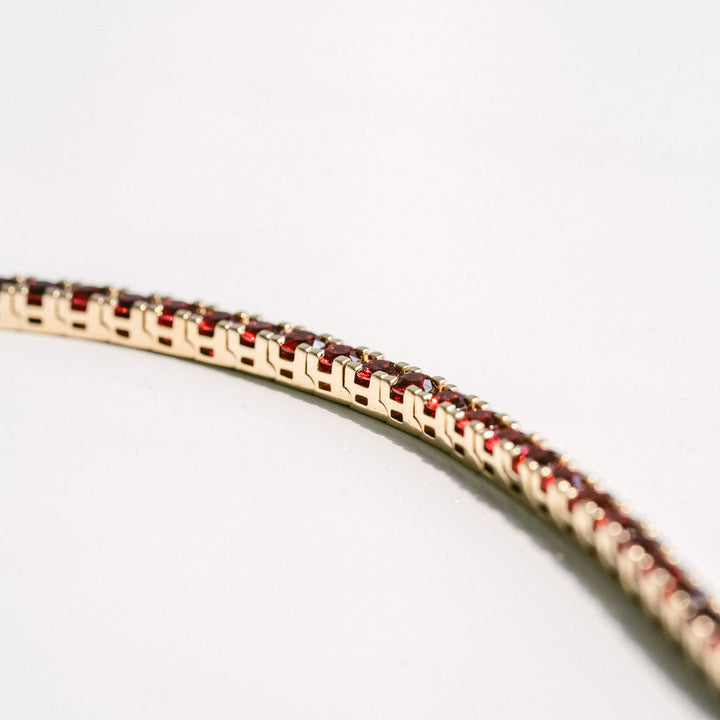 Round Ruby Tennis Bracelet With Flat Prongs