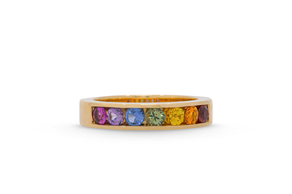 LIMITED EDITION - RAINBOW SAPPHIRE CHANNEL SET BAND IN SUPPORT OF LGBTQ+ COMMUNITIES 14K YELLOW GOLD