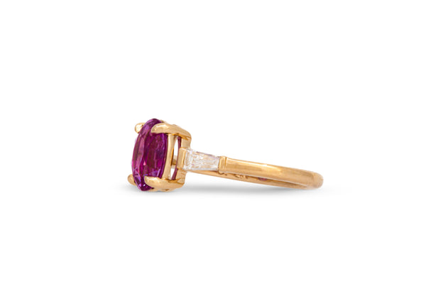 2.18ct. Oval Magenta Sapphire Ring With Tapered Diamond Baguette Accents