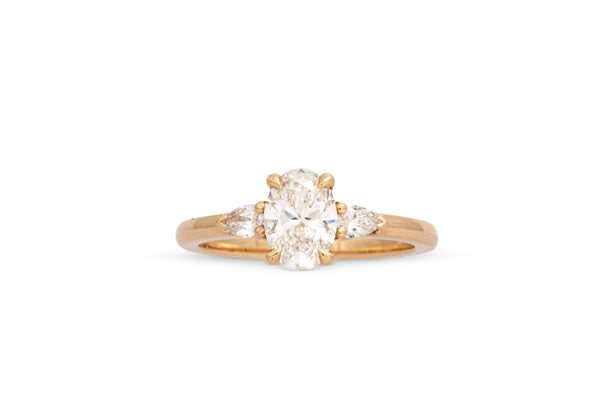 1.00ct. Approx. Oval Diamond Engagement Ring With Pear Shape Accents 14k Yellow Gold