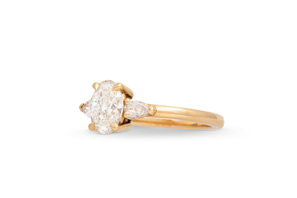 1.00ct. Approx. Oval Diamond Engagement Ring With Pear Shape Accents 14k Yellow Gold
